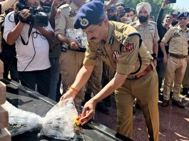 DGP R R Swain paying tribute to martyrs at Balidan Stambh on Monday. -Excelsior/Shakeel