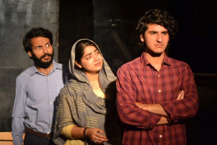 A scene from the play ‘Antraal Ke Baad’ being staged at Jammu on Sunday.