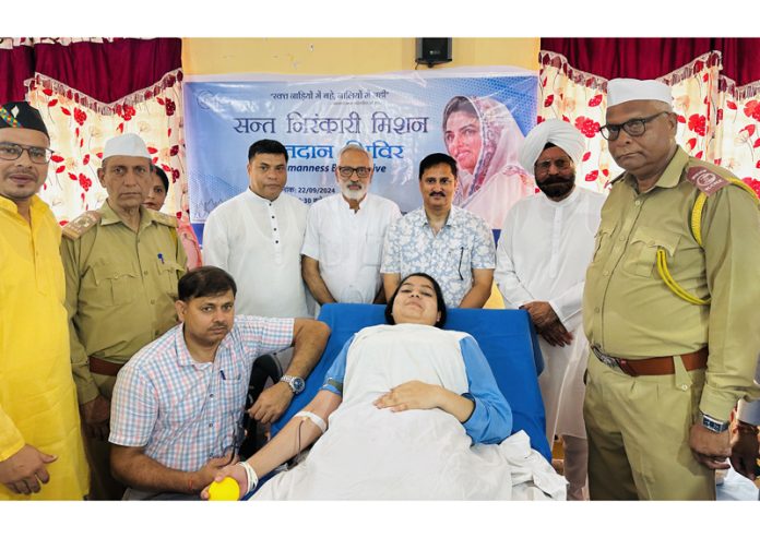 A volunteer donating blood at a camp in Kathua on Sunday.