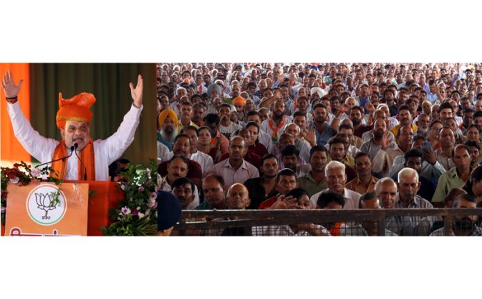 Union Home Minister Amit Shah addressing BJP workers at Paloura in Jammu on Saturday. —Excelsior/Rakesh