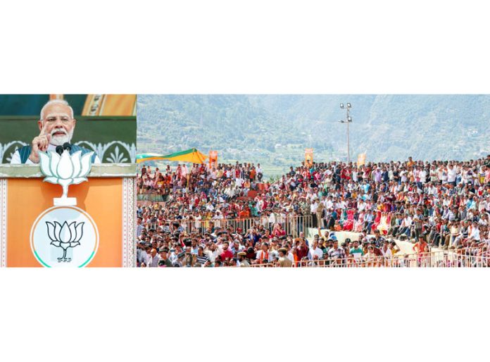 PM Narendra Modi addressing a massive rally at Doda on Saturday. —Excelsior/Tilak Raj