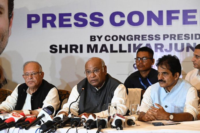 Congress president Mallikarjun Kharge along with KC Venugopal and Tariq Hameed Karra at a press conference in Srinagar on Wednesday. -Excelsior/Shakeel