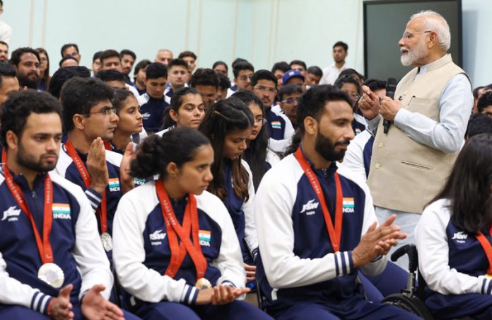 Prime Minister Narendra Modi interacting with the Indian Contingent of the Paris Paralympic 2024 in New Delhi on Thursday.(UNI)