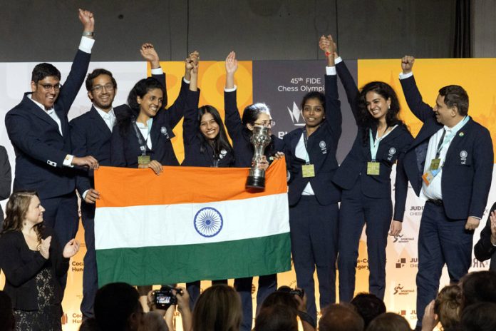 Members of gold medalist team India celebrate their victory at the awards ceremony of the Women's category of the 45th FIDE Chess Olympiad Budapest 2024 in Hungary. (UNI)