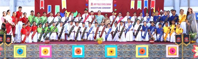 Newly elected students council of APS Damana posing along with school management.