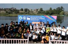 Athletes posing along with dignitaries during 10th UT Canoe Sprint Championship at Srinagar.