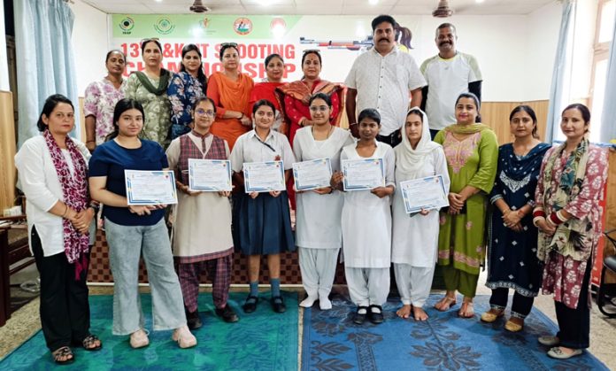 Players posing along with certificates during a competition.