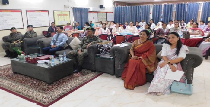 Dignitaries and teaching faculty of APS Sunjuwan keenly listening resource persons during workshop.