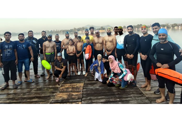 Swimmers posing during an event at Srinagar.