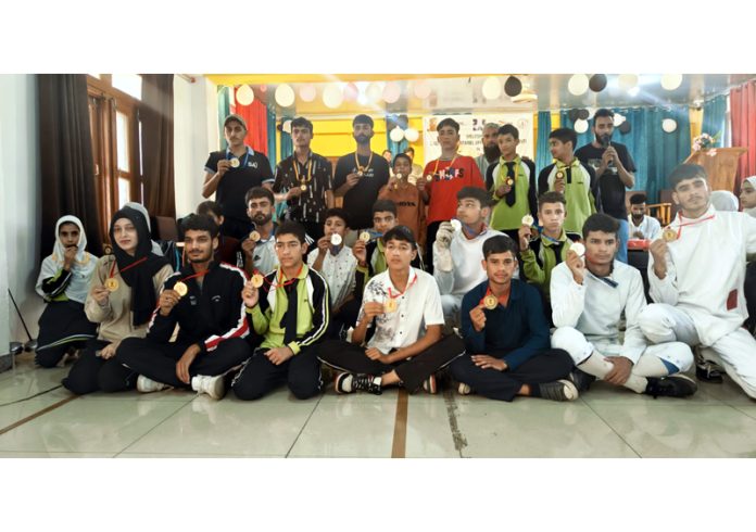 Fencers posing for group photograph at Ramban.