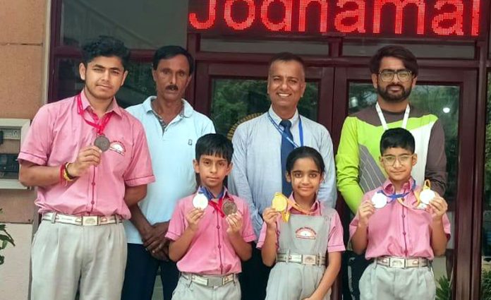 Jodhamal skaters posing along with school management.