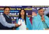 Sheetal Devi and Rakesh Kumar posing along with CEC Rajiv Kumar at Nirvachan Sadan during a programme.