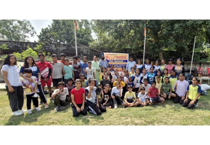 Handball players posing for group photograph during a match at RS Pura.