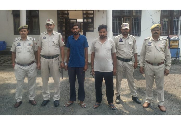 Police posing along with the auto-lifters arrested in Kathua on Sunday.