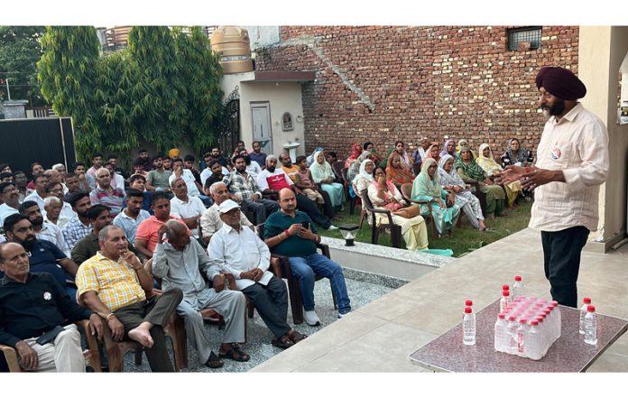 Apni Party candidate, Manjit Singh addressing a public meeting in Vijaypur on Saturday.