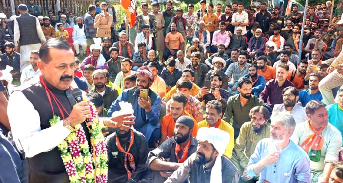 Union Minister Dr Jitendra addressing a BJP election public meeting in remote Chhatru area of Inderwal Assembly constituency on Friday.