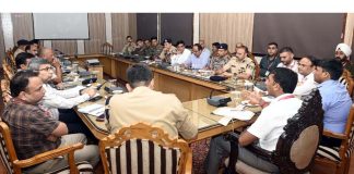 Anshul Garg chairing review meeting on Monday.