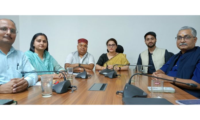 Neha Jalali chairing a meeting of IIMC Jammu on Monday.