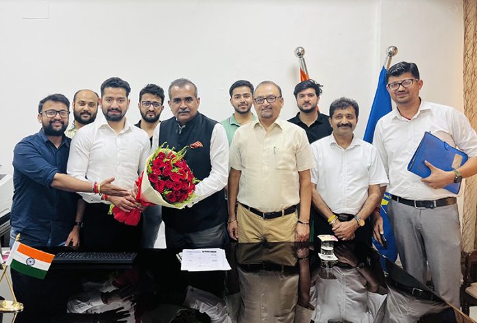 ICAI J&K delegation presenting a bouquet to Vikram Sahay, PCIT for J&K and Ladakh.