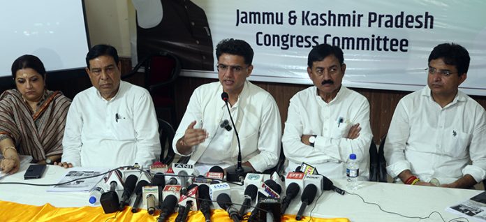 AICC general secretary Sachin Pilot, flanked by AICC I/C J&K Bharatsinh Solanki & others addressing a press conference in Jammu. —Excelsior/Rakesh