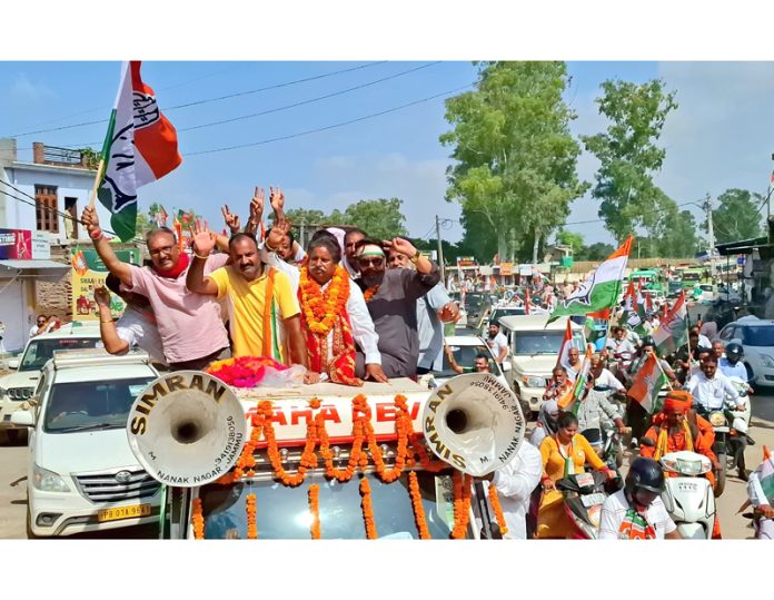 Cong candidate from Jammu South Raman Bhalla leading a Cong rally on Sunday.