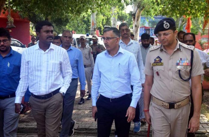 EO Karthik Manickam and DEO Rajesh Sharma during visit to border areas on Friday.