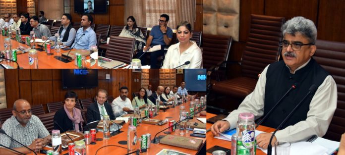 Chief Secretary chairing a meeting.