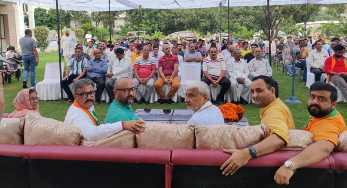 Senior BJP leader Sham Lal Sharma addressing a public rally on Tuesday.