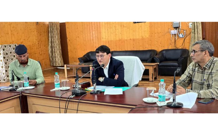 DM Baramulla chairing a meeting on Tuesday.