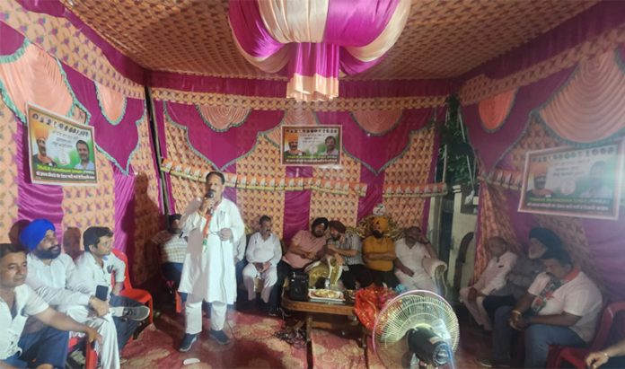 Congress leader Manmohan Singh addressing a gathering in Jammu West on Tuesday.