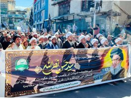 People taking out a procession through Kargil town in mourning of the martyrdom of Sayyed Hassan Nasrallah. -Excelsior/Basharat Ladakhi