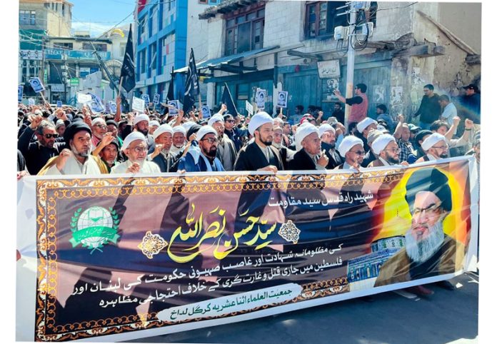 People taking out a procession through Kargil town in mourning of the martyrdom of Sayyed Hassan Nasrallah. -Excelsior/Basharat Ladakhi