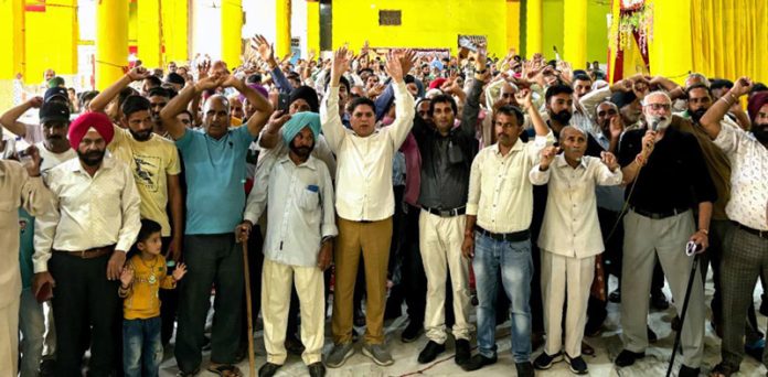 Members of SOS International and PoJK refugees meeting at Nowshera on Sunday.