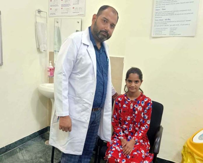 Dr Chaudhary with his patient at Narayana Hospital, Katra.