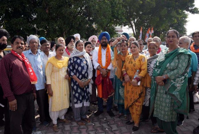 Taranjit Singh Tony, senior Congress leader posing with the people in Jammu on Wednesday.