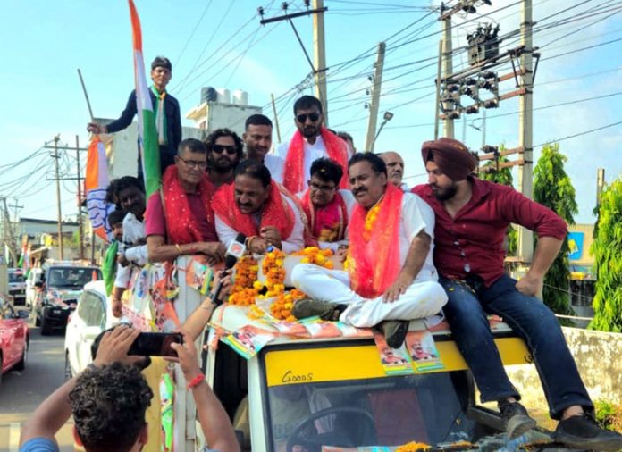 Thakur Manmohan Singh along with his supporters during a rally in Jammu on Sunday.