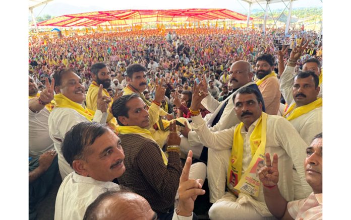 Independent candidate from Udhampur East, Pawan Khajuria addressing a mammoth election rally at Modi Ground Udhampur on Sunday.