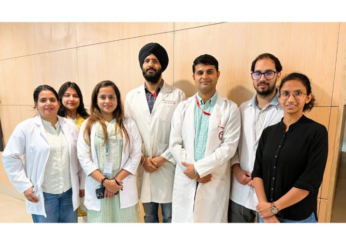 The ENT surgeons of AIIMS Jammu posing together after performing a critical procedure.