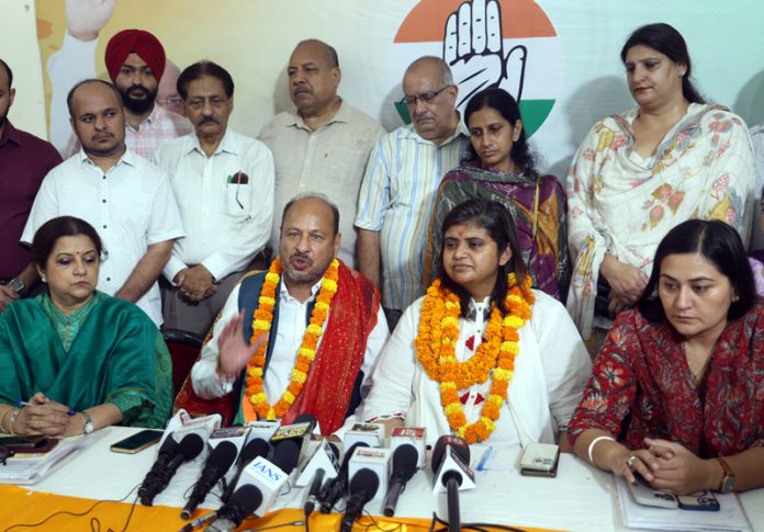 Newly appointed Congress acting working presidents, Mohinder Bhardwaj and Bhanu Mahajan during a press conference at Jammu. -Excelsior/Rakesh