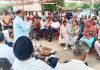 BJP candidate from Ramgarh and former Minister, D K Manyal addressing an election meeting in his constituency on Friday.