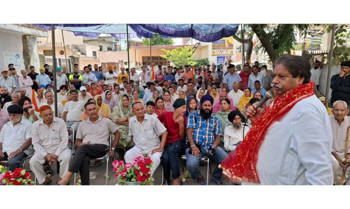 Cong working president, Raman Bhalla addressing an election meeting in Jammu South.