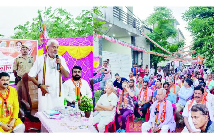 Sham Lal Sharma addressing a public gathering in Jammu North on Friday.