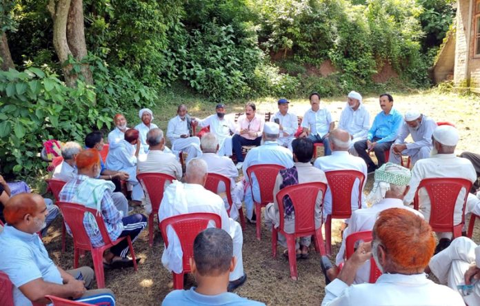 Cong leader Yogesh Sawhney interacting with people in Jammu East on Friday.