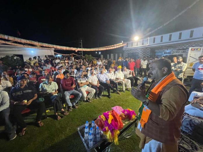 BJP candidate from Bahu constituency, Vikram Randhawa addressing a public meeting in Sanjay Nagar on Sunday.