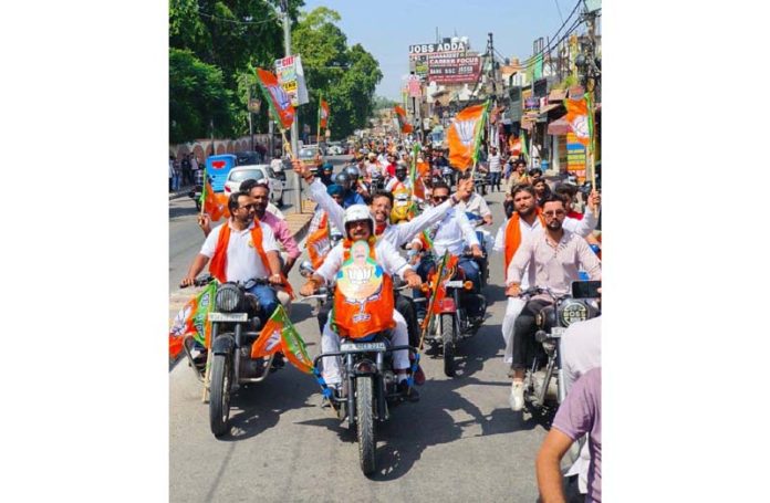 BJP activists taking out bike rally in Jammu East on Monday.