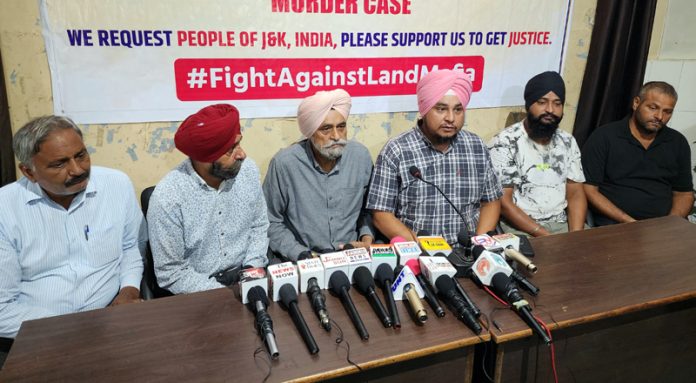 Family members of murder victim addressing press conference at Jammu on Thursday.-Excelsior/Rakesh