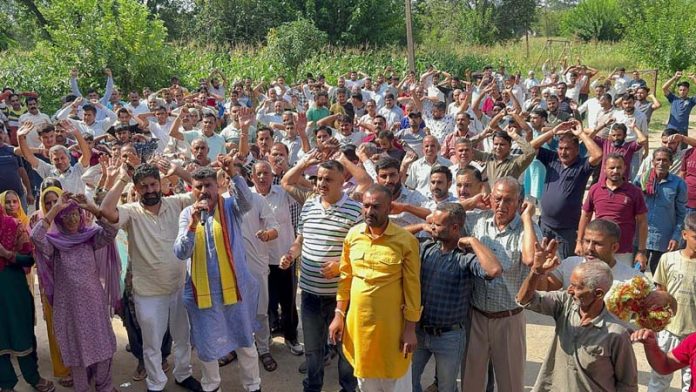 Independent candidate from Udhampur East, Pawan Khajuria during an election meeting in his constituency on Monday.