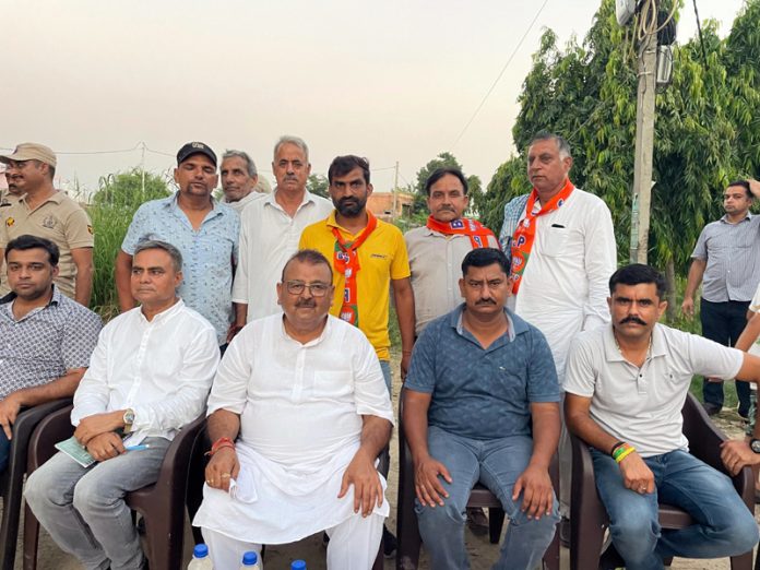 BJP candidate from Vijaypur, Chander Parkash Ganga during an election meeting in Vijaypur on Tuesday.