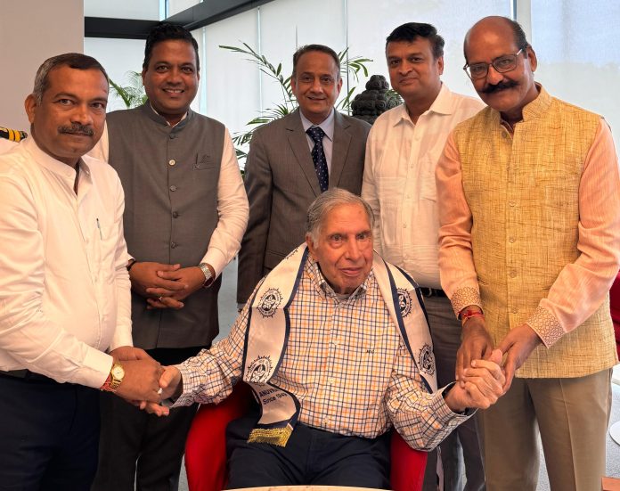 Team members of Anuvrat Vishva Bharati posing for a photograph with noted industrialist and philanthropist Ratan Tata in Mumbai.