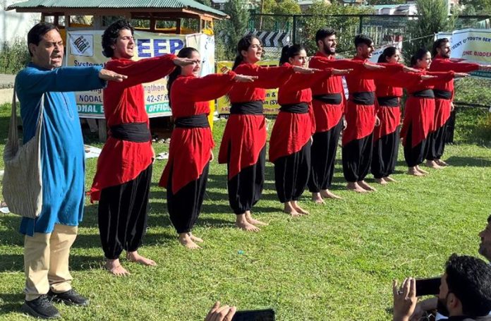 A scene from the play ‘Loktantra Ka Asli Mantra’ being staged at Anantnag on Saturday.